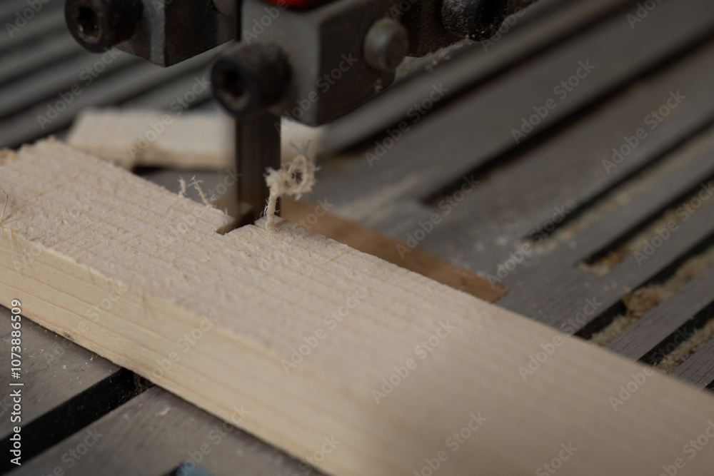 Band Saw Cutting Through Wooden Plank
Band Saw Cutting Through Wooden Plank