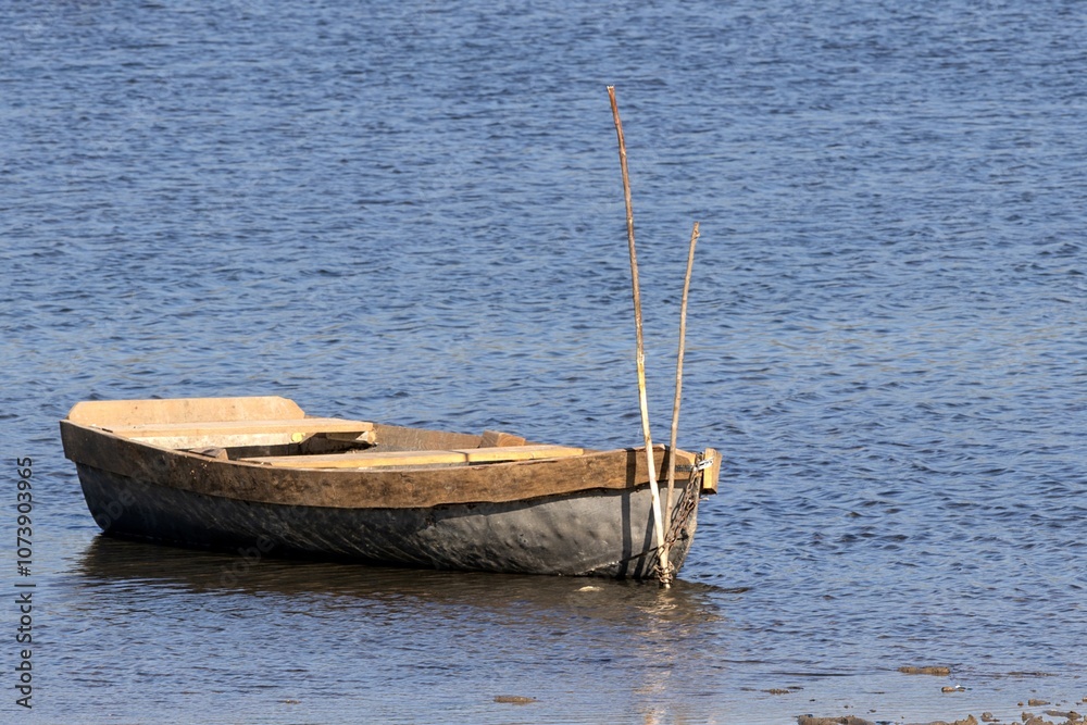 A Boat Docked at the Shore