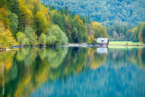 lake offensee in austria whit a small home 