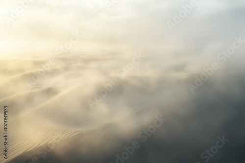 Fototapeta Naklejka Na Ścianę i Meble -  Desert Landscape with Fog: Sand dunes partially covered in morning fog