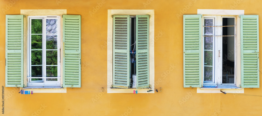 Fototapeta premium Italian shutter windows with decoration