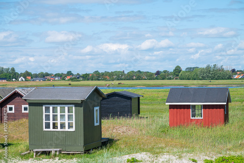 small beach houses near the beach of village of Asaa in Northern Denmark