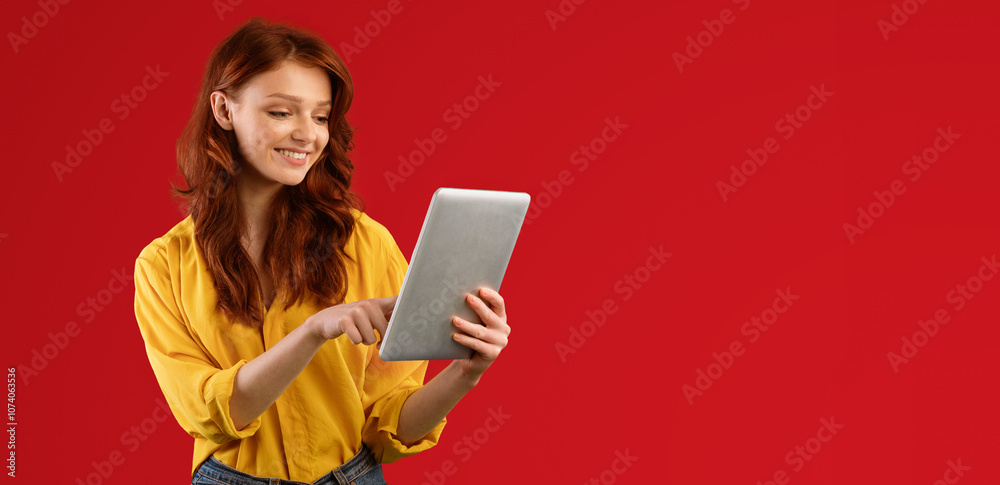 Teen Girl Using Digital Tablet Browsing Internet Posing Over Green Background. Panorama, Studio Shot, Free Space Teen Girl Using Digital Tablet Browsing Internet Posing Over Green Background. Panorama, Studio Shot, Free Space