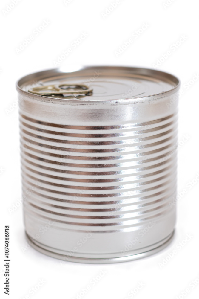 Round Unopened Tin Can Isolated on White Background. Canned Food. Aluminum Can for Safe and Long Term Storage of Food. Steel Sealed Food Storage Container - Isolation Round Unopened Tin Can Isolated on White Background. Canned Food. Aluminum Can for Safe and Long Term Storage of Food. Steel Sealed Food Storage Container - Isolation