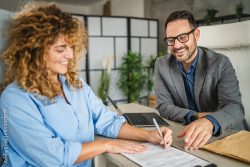 male colleague persuade a female colleague to signing a contract