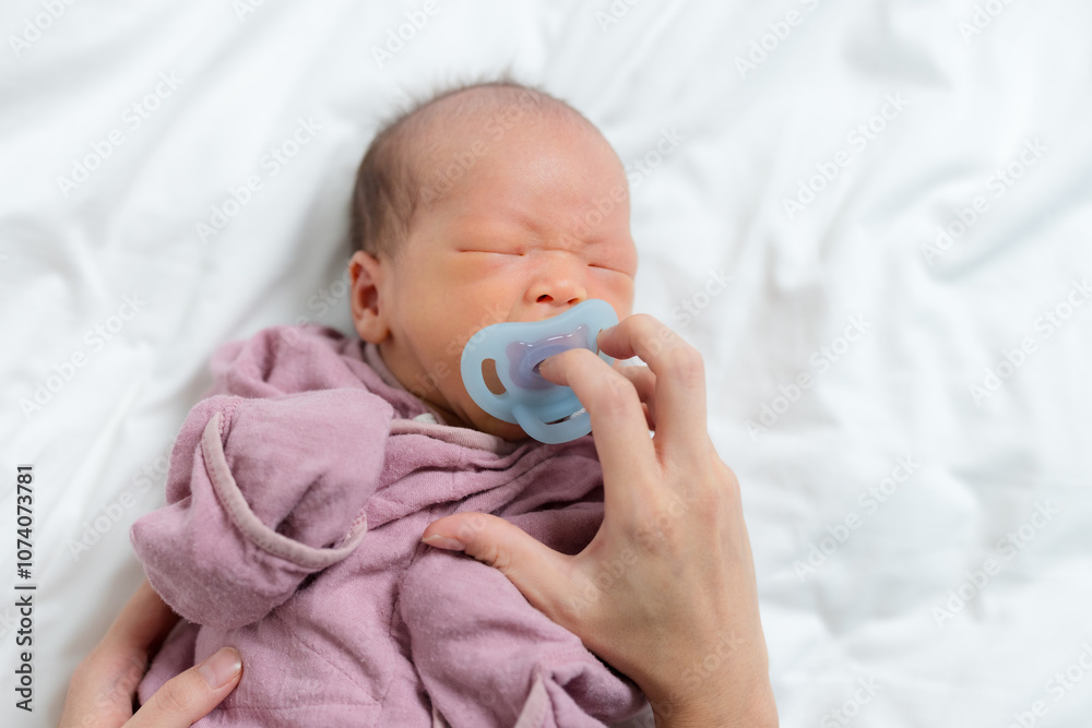 Baby cry for the pacifier and lying on bed Baby cry for the pacifier and lying on bed