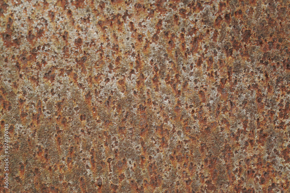 Texture or background of the walls of rusted steel sheets are an orange color, very dark and abstract. Texture or background of the walls of rusted steel sheets are an orange color, very dark and abstract.