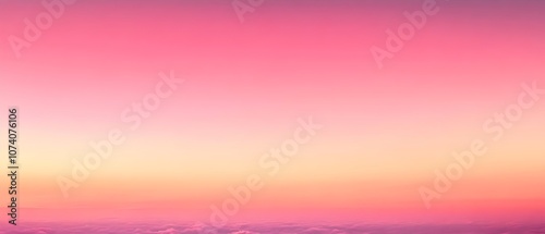 A serene and dreamy sky at sunset, blending soft pink and purple hues above a gentle cloud layer, creating a tranquil and captivating atmosphere.