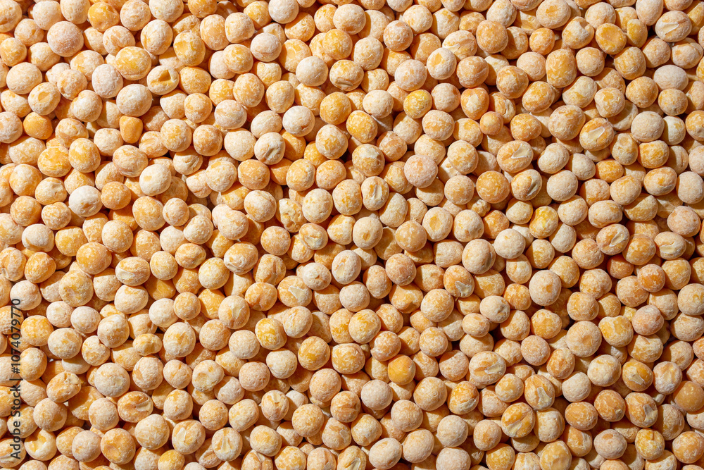 Uncooked Yellow Polished Peas Background. A Culinary Canvas of Dry Yellow Peas, Creating a Lively and Textured Background for Gourmet Cooking. Scattered Raw Polished Peas. Healthy Eating Ingredients Uncooked Yellow Polished Peas Background. A Culinary Canvas of Dry Yellow Peas, Creating a Lively and Textured Background for Gourmet Cooking. Scattered Raw Polished Peas. Healthy Eating Ingredients