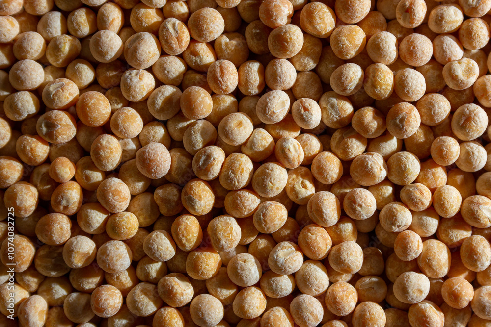 Uncooked Yellow Polished Peas Background. A Culinary Canvas of Dry Yellow Peas, Creating a Lively and Textured Background for Gourmet Cooking. Scattered Raw Polished Peas. Healthy Eating Ingredients Uncooked Yellow Polished Peas Background. A Culinary Canvas of Dry Yellow Peas, Creating a Lively and Textured Background for Gourmet Cooking. Scattered Raw Polished Peas. Healthy Eating Ingredients
