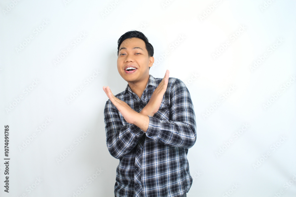 asian man show rejection signs with smiling face isolated on white background asian man show rejection signs with smiling face isolated on white background