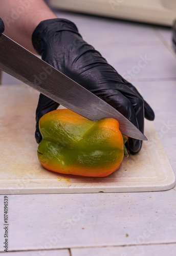 Cooking and cutting paprikas photo