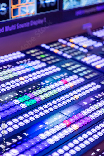 Switchboard for live broadcast production. Equipment in outside broadcasting van. Video switcher of Television Broadcast. Live Switcher Video Mixer for Shows and Television. Mix board. Selective focus