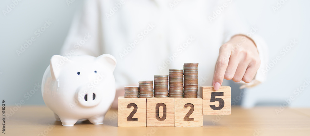 © Jo Panuwat D - 2024 end year to Happy New Year 2025 with piggy bank. Resolution, Goals, Plan, Action, Money Saving, Retirement fund, Pension, Investment and Financial concepts © Jo Panuwat D - 2024 end year to Happy New Year 2025 with piggy bank. Resolution, Goals, Plan, Action, Money Saving, Retirement fund, Pension, Investment and Financial concepts