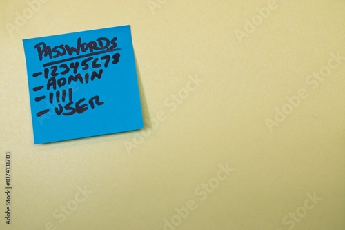 Password list on a blue sticky note photo