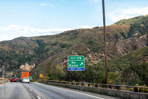 Glenwood Springs, Colorado interstate highway 70 road with No Name city exit sign for rest area in summer by Glenwood canyon mountains