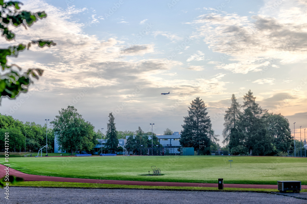 Zurich, Switzerland - July 26, 2024: A sports field and track at sunrise in Zurich Switzerland
Zurich, Switzerland - July 26, 2024: A sports field and track at sunrise in Zurich Switzerland