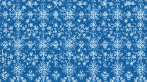 Light blue snowflakes seamless pattern on a blue background perfect for Christmas themed wrapping paper greeting cards and festive decor