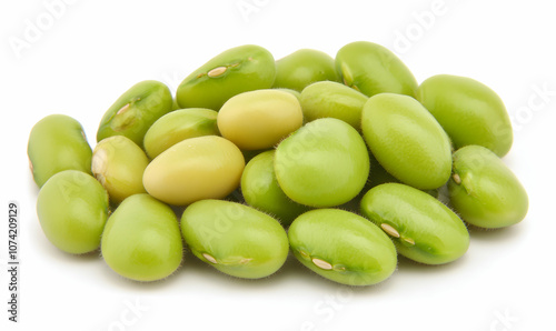 A close-up shot of a pile of green edamame beans on a white background.