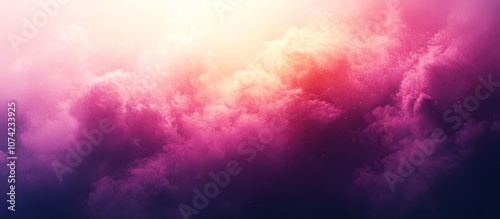 Pink and purple clouds with a sunbeam in the sky.