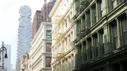 New York City Manhattan Soho fashion district near Broadway street. USA urban building facade, old american architecture. Shopping in NYC, United States. Business and residential real estate. Lantern photo