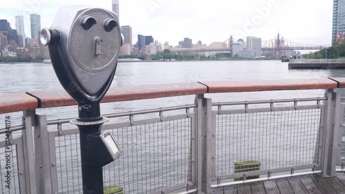 New York City waterfront skyline, Manhattan Midtown buildings, riverfront skyscrapers by East river. Waterside cityscape, tower viewer, Gantry Plaza. Long Island, Queens. United States tourism. Rainy.