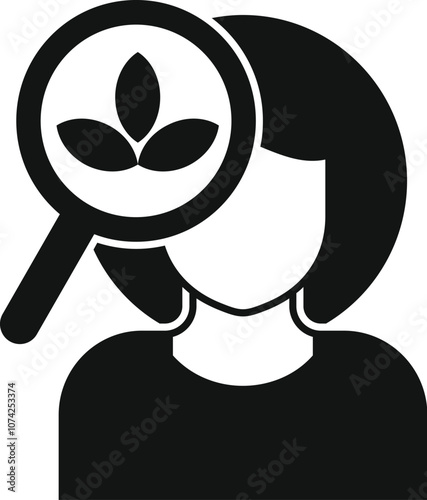 Magnifying glass showing natural leaves in front of woman promoting eco friendly and sustainable lifestyle