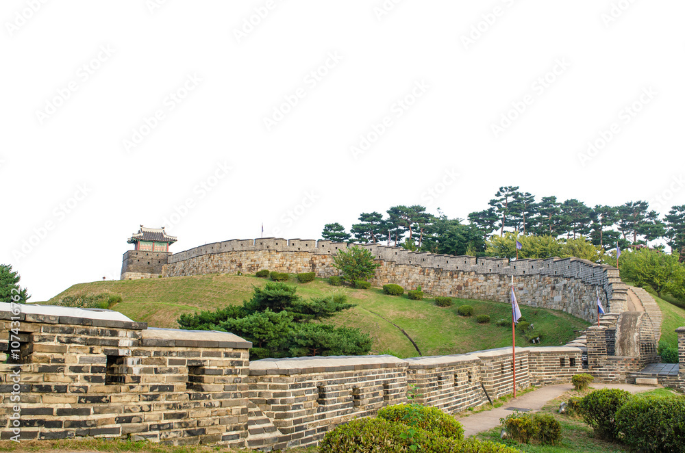 Suwon Hwaseong Fortress is a fortress wall during the Joseon Dynasty isolate on white background with clipping path. Suwon Hwaseong Fortress is a fortress wall during the Joseon Dynasty isolate on white background with clipping path.