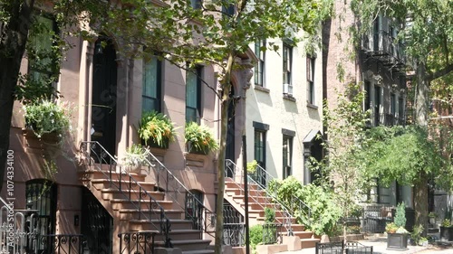 New York City townhouse building, Brooklyn Heights residential district, USA. Brownstone urban architecture, attached house. United States real estate, american property, apartments and homes in NYC.