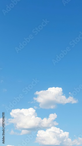 Clear blue sky background with fluffy white clouds scattered throughout, creating a serene and peaceful atmosphere, peaceful