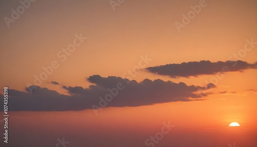 Beautiful sky with soft gradient colors transitioning from blue to vibrant orange at sunset time