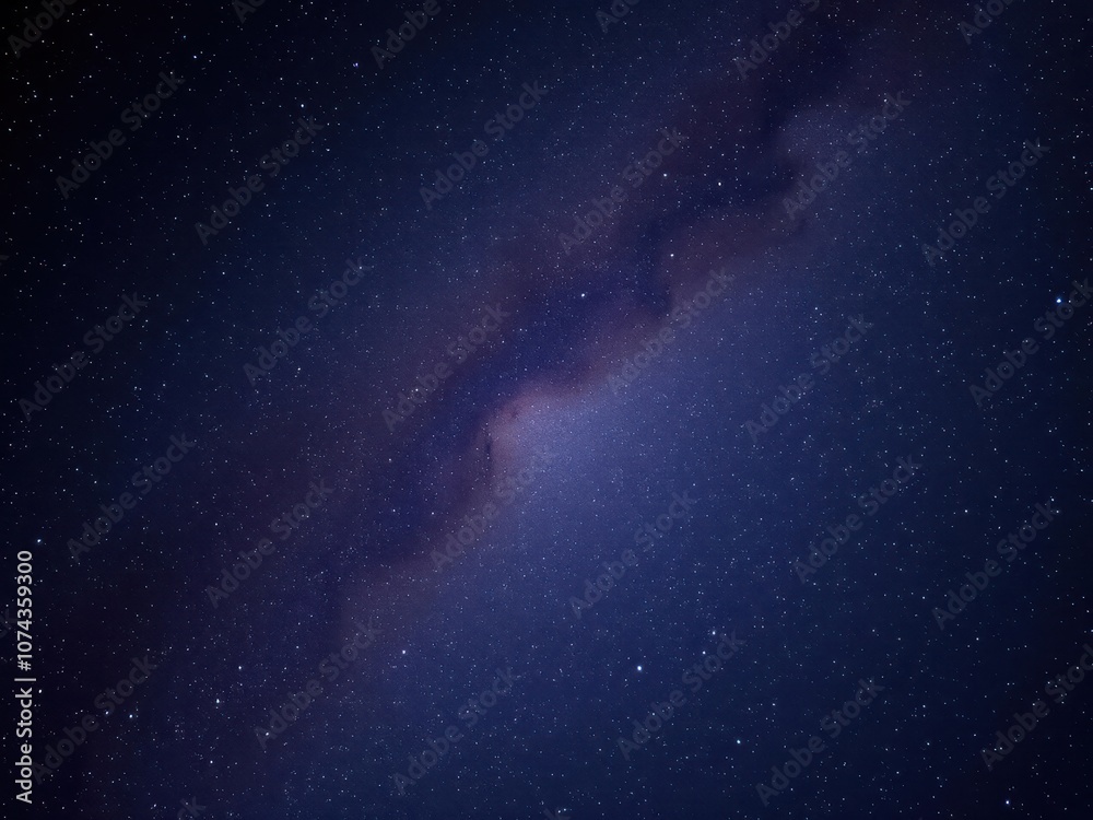 Fototapeta premium Night sky filled with sparkling stars against a black backdrop, cosmic, milky way, galaxy