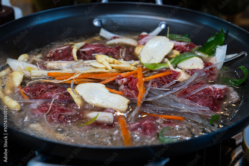 ginseng bulgogi boiling in the pan ginseng bulgogi boiling in the pan