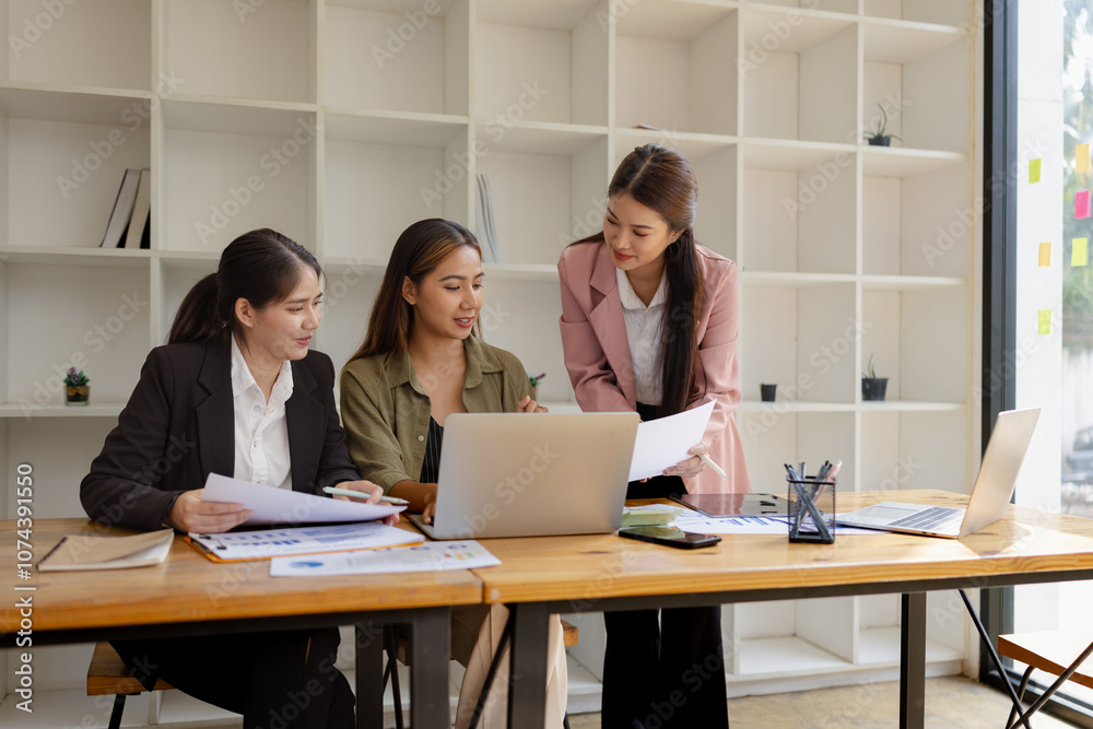 Asian businesswoman teamwork working on laptop with finances analysis report at desk in office, business financing, accounting banking, Team of creative and business planning, Asian businesswoman teamwork working on laptop with finances analysis report at desk in office, business financing, accounting banking, Team of creative and business planning,