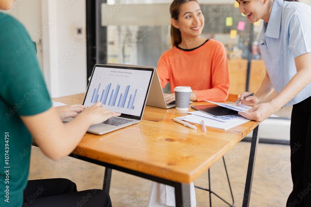Technology and financial advisory services concept. Businesswoman teamwork and working on digital laptop computer with advisor showing plan of investment to clients at table office. Digital marketing.