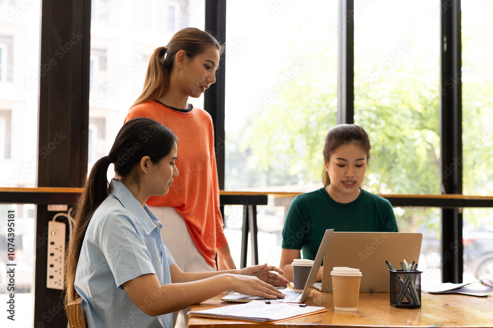 group of asian businesswoman working on laptop with finances analysis report at desk in office, business financing, accounting banking, Team of creative and business planning, group of asian businesswoman working on laptop with finances analysis report at desk in office, business financing, accounting banking, Team of creative and business planning,