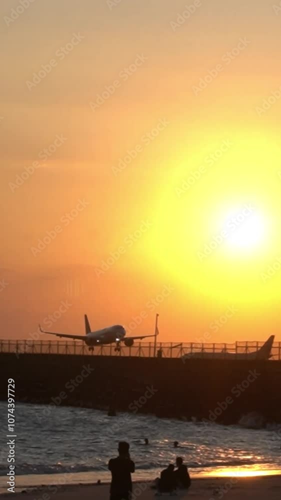 Silhouette of a plane landing at the airport near Kelan beach in the afternoon while enjoying the sunset Silhouette of a plane landing at the airport near Kelan beach in the afternoon while enjoying the sunset
