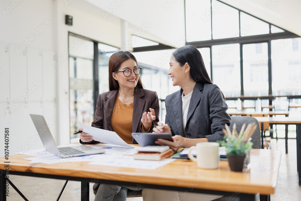 Two businesswoman working with analysis data investment plan, Business startup and marketing presentation, Two businesswoman working with analysis data investment plan, Business startup and marketing presentation,