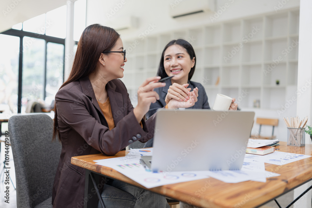 Two businesswoman working with analysis data investment plan, Business startup and marketing presentation, Two businesswoman working with analysis data investment plan, Business startup and marketing presentation,