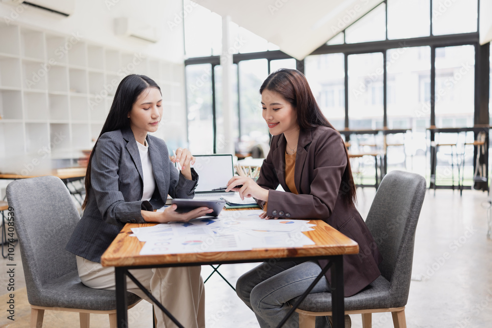 Two businesswoman working with analysis data investment plan, Business startup and marketing presentation,