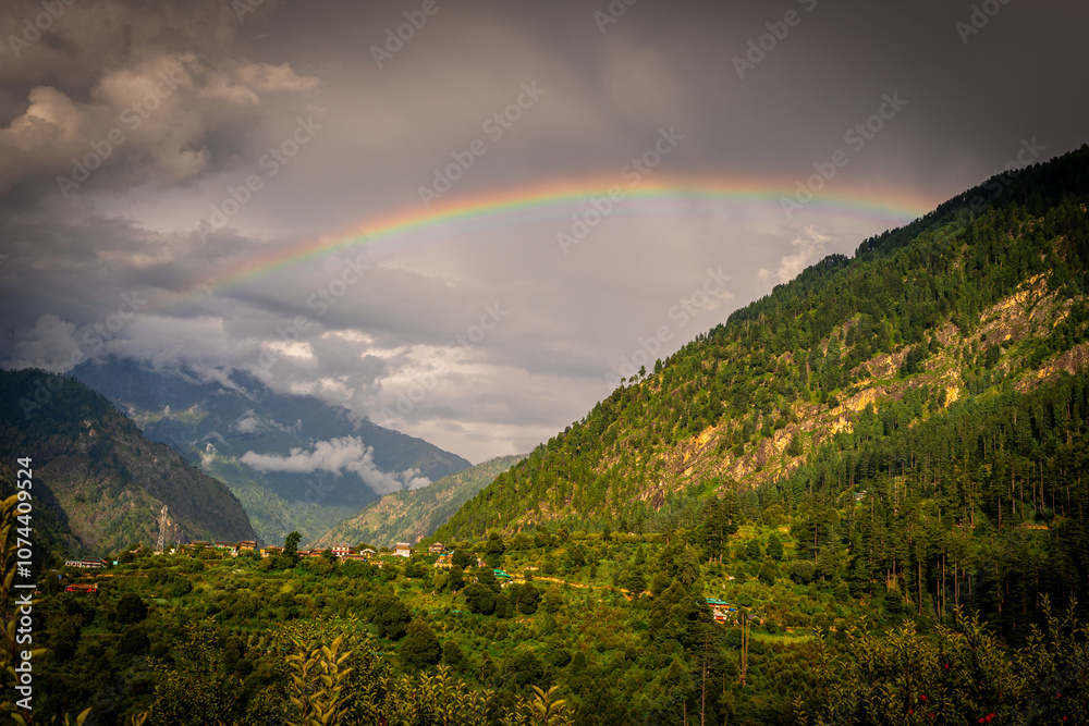 Beautiful mountains of Parvati Valley with a rainbow in Himachal Pradesh, india Beautiful mountains of Parvati Valley with a rainbow in Himachal Pradesh, india