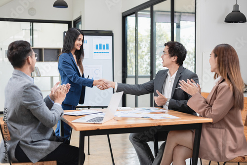 Asian business teamwork working with analysis report and advisor showing plan, Financial analysis and Marketing teamwork concept.