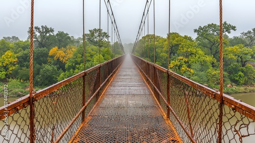 Tourist on Krasae Cave railway bridge, misty photo