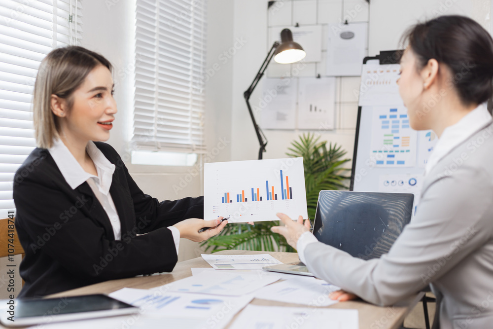 Two businesswoman working with analysis data investment plan, Business startup and marketing presentation, Two businesswoman working with analysis data investment plan, Business startup and marketing presentation,