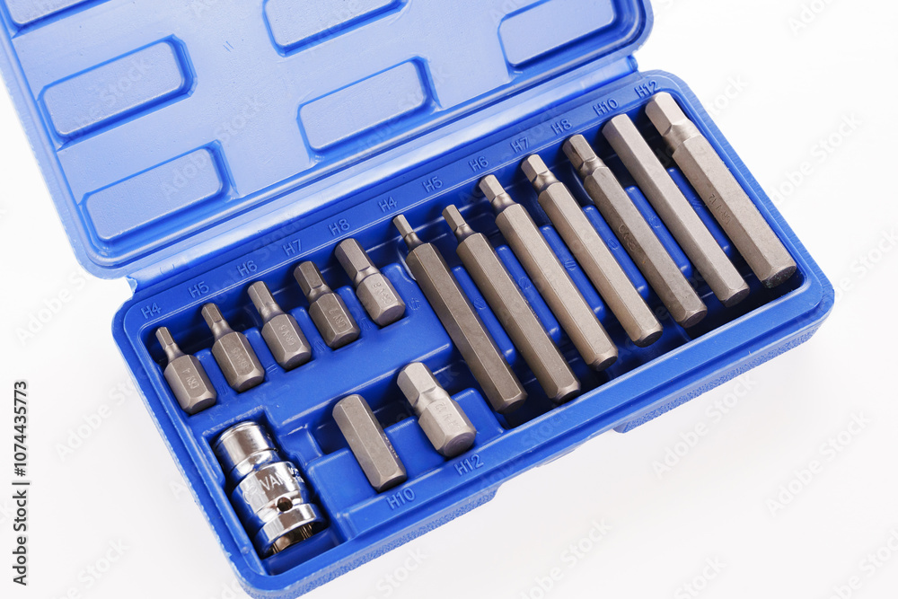 A set of single-sided chrome steel bits in a blue plastic box A set of single-sided chrome steel bits in a blue plastic box