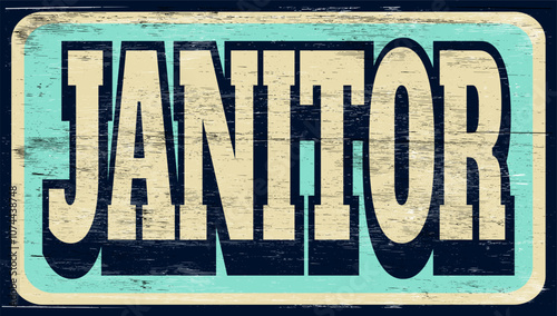 Aged vintage janitor sign on wood