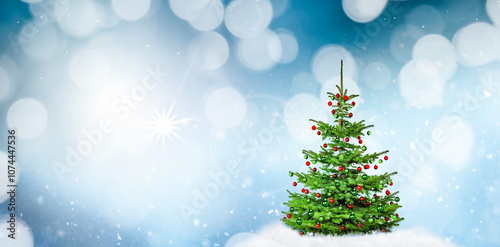 Blauer unscharfer Weihnachtshintergrund mit Weihnachtsbaum