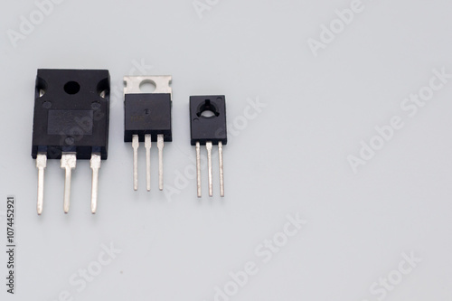 Transistor mounted on a breadboard with a white background. photo