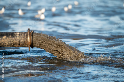 Beach restoration using a sand transfer system
