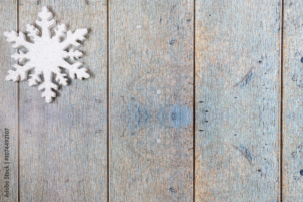 White decorative snowflakes on wooden background, copy space White decorative snowflakes on wooden background, copy space